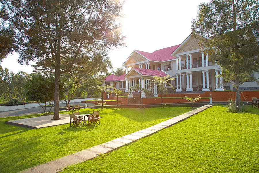 The gardens of Salinero Millie Lodge at Machame, 1,800 m — the last comfortable night before the gate